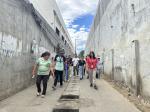 Team along the only Drainage System in the Purok