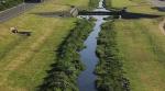 Kuilsriver floodplain/wetland/detention pond (source: https://www.zutari.com/project/upgrading-kuils-river/)